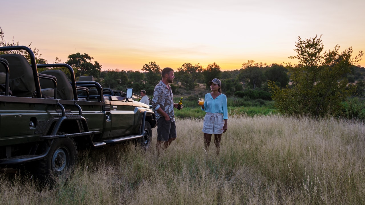asian-women-and-european-men-on-safari-game-drive