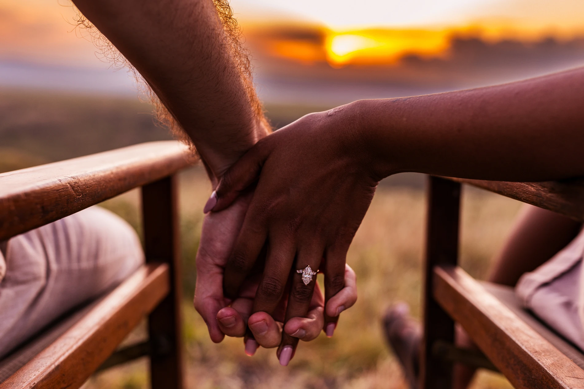 romantic-couple-holding-hands-at-sunset-engagement-2026-09-24-03-13-06-utc